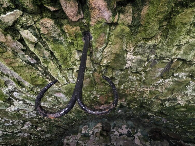 An old hook inside Tolquhon Castle. Image: Gayle Ritchie.