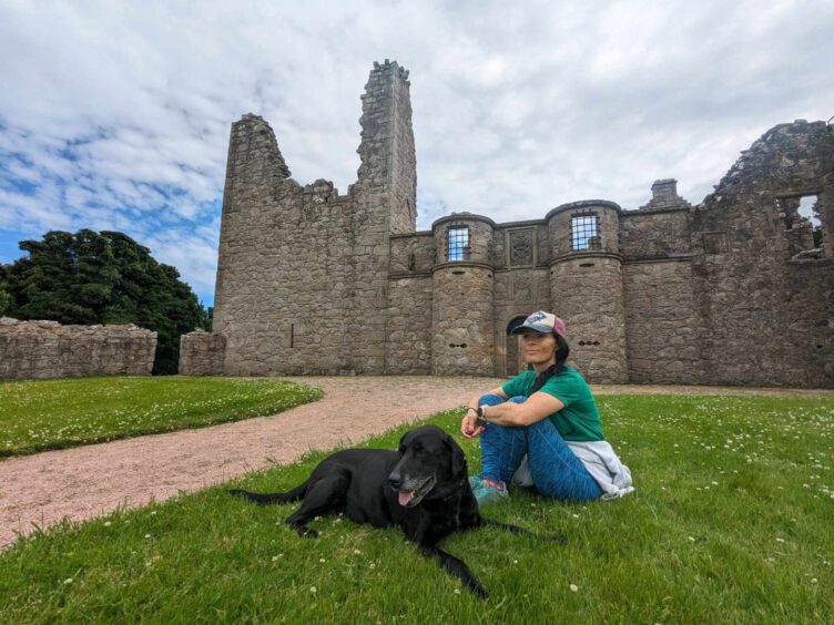 Gayle and her mum's dog Cody outside Tolquhon Castle. Image: Gayle Ritchie.