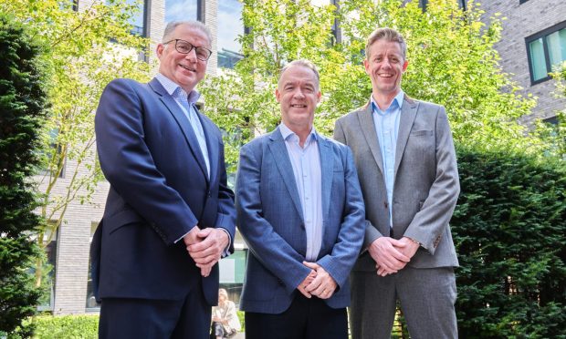 Glacier chairman Nick Horler. chief executive Scott Martin and chief financial officer Mark Ritchie.