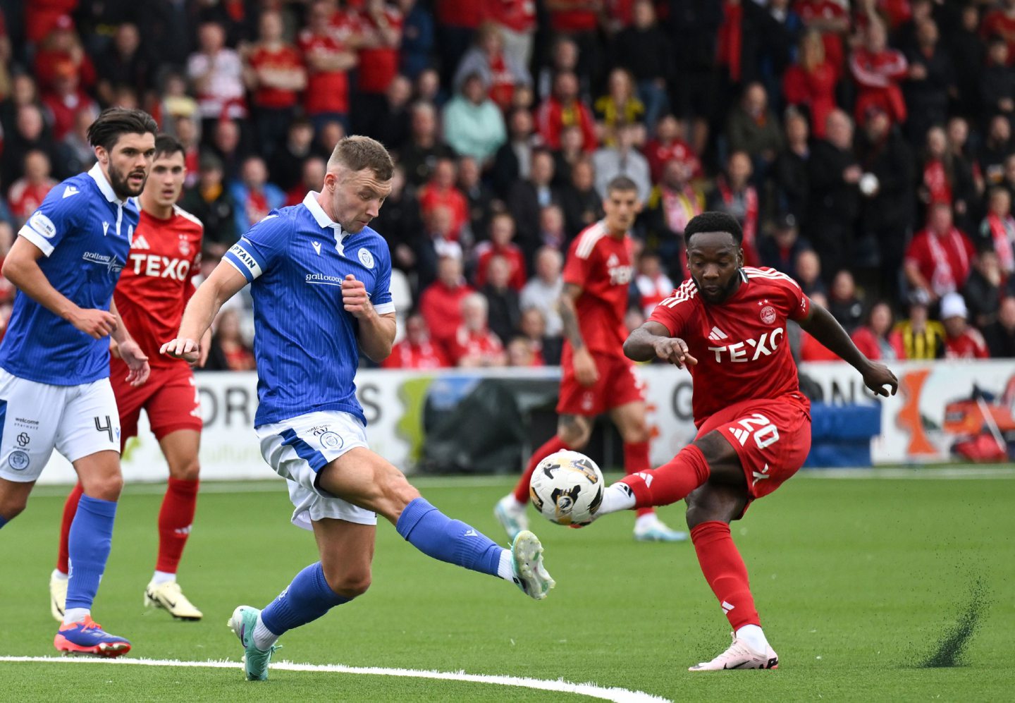 Shayden Morris of Aberdeen sees his shot blocked by Matty Douglas of Queen of the South. Image: Shutterstock