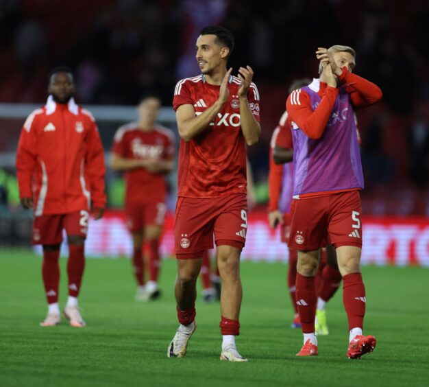 Bojan Miovski and Richard Jensen of Aberdeen after the defeat of Airdrie. Image: Shutterstock