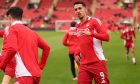 Aberdeen striker Bojan Miovski warms up before the cup clash with Airdrie at Pittodrie. Image: Shutterstock