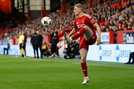 Aberdeen defender Jack MacKenzie in action against Airdrie. Image; Shutterstock