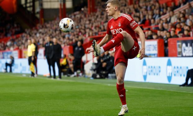 Aberdeen defender Jack MacKenzie in action against Airdrie. Image; Shutterstock