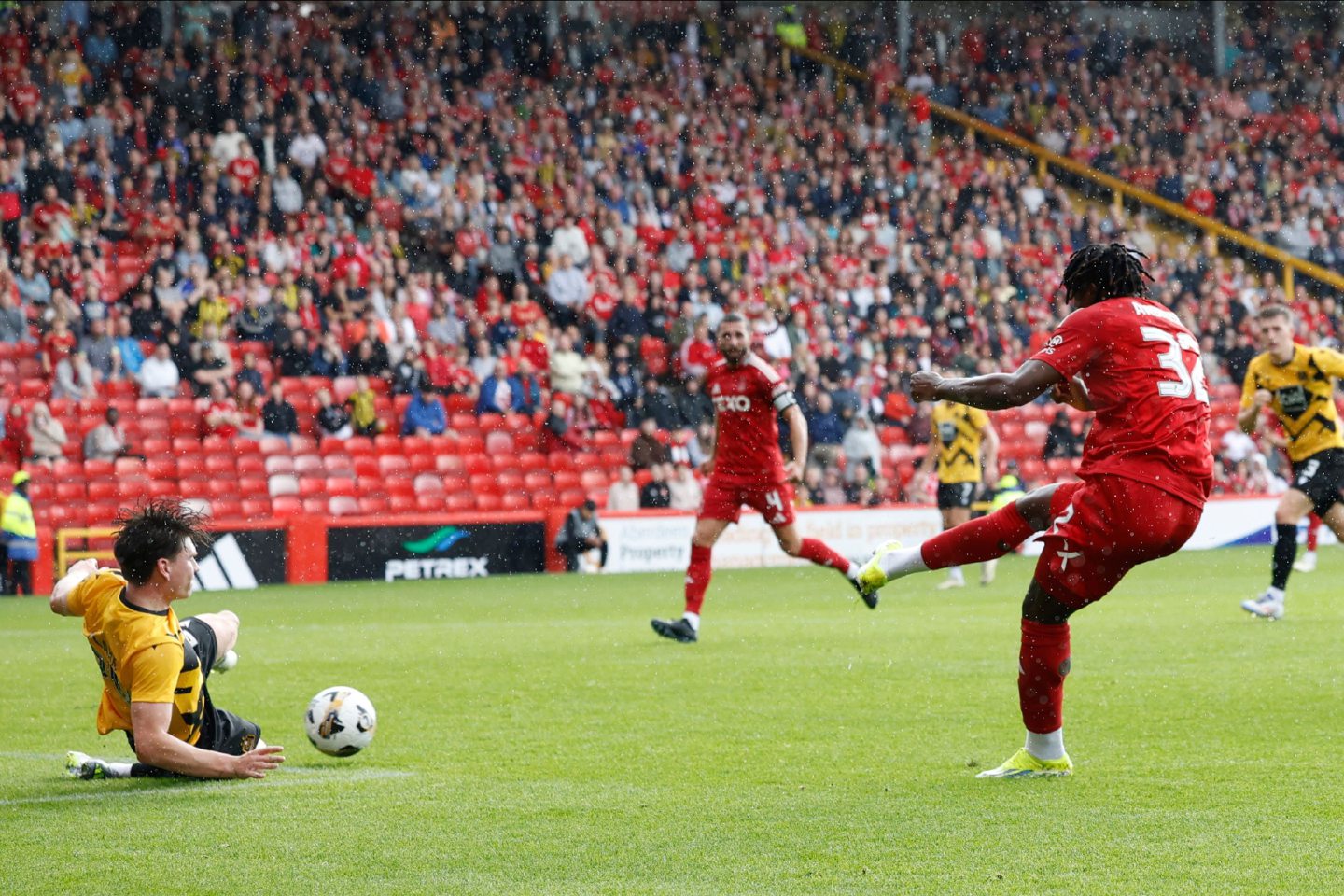 Aberdeen summer signing Peter Ambrose scores to make it 4-0 against Dumbarton. Image: Shutterstock 