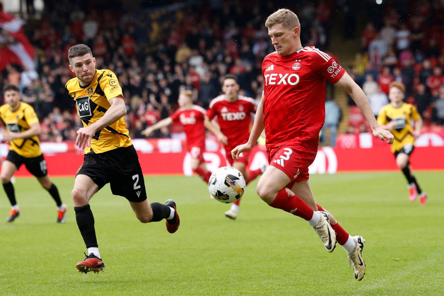 Jack MacKenzie (3) of Aberdeen during the Premier Sports Scottish League Cup match against Dumbarton. Image: Shutterstock 