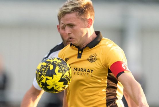 Nairn County captain Fraser Dingwall has pledged his future to the club until 2026. Image: Jasperimage
