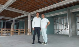 Jonathan Lau (left) and Chung Wong (right) at the new Aberdeen beach food hall, which is now under construction.