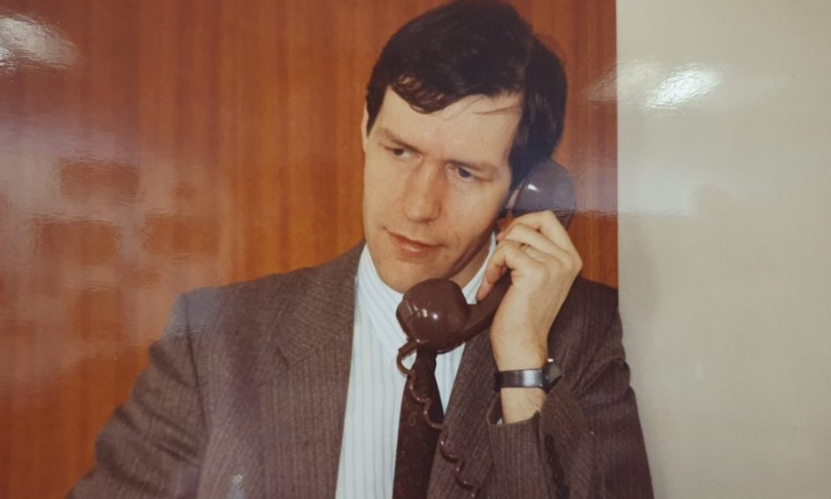 Ron Stewart on telephone in archive photo. 