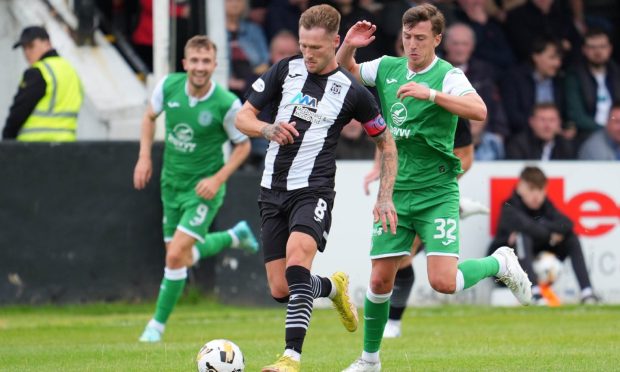 ELGIN, SCOTLAND - JULY 13: Hibernian's Josh Campbell and Elgin's Brian Cameron in action during a Premier Sports Cup group stage match between Elgin City and Hibernian at Borough Briggs, on July 13, 2024, in Elgin, Scotland. (Photo by Simon Wootton / SNS Group)