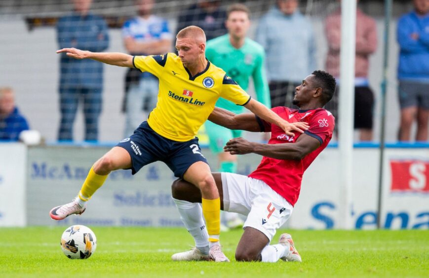 Akil Wright in action for Ross County against Stranraer