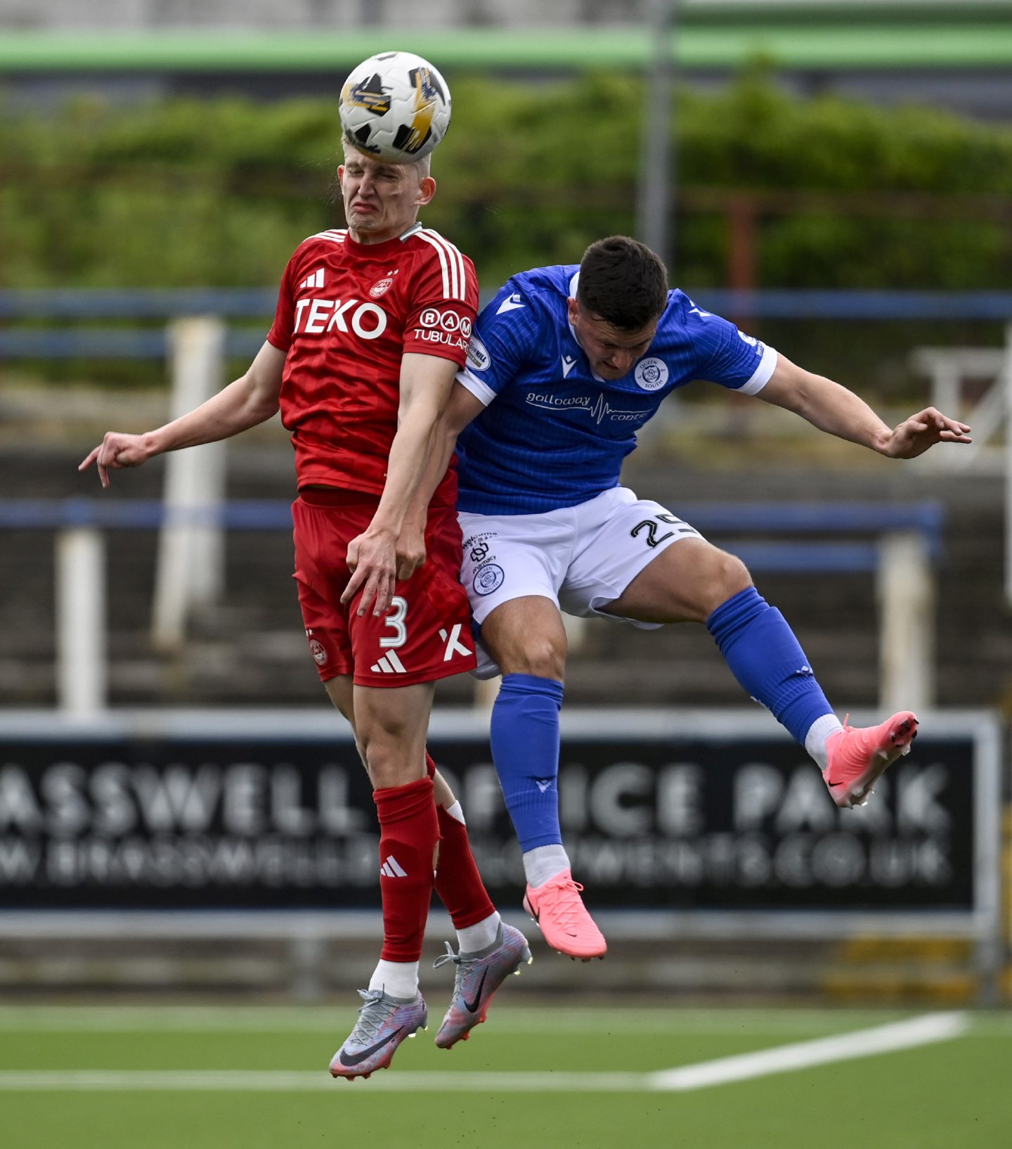 Aberdeen's Jack Mackenzie (L) and Queen of the South's Kyle Doherty in action during a Premier Sports Cup group stage match. Image: SNS 