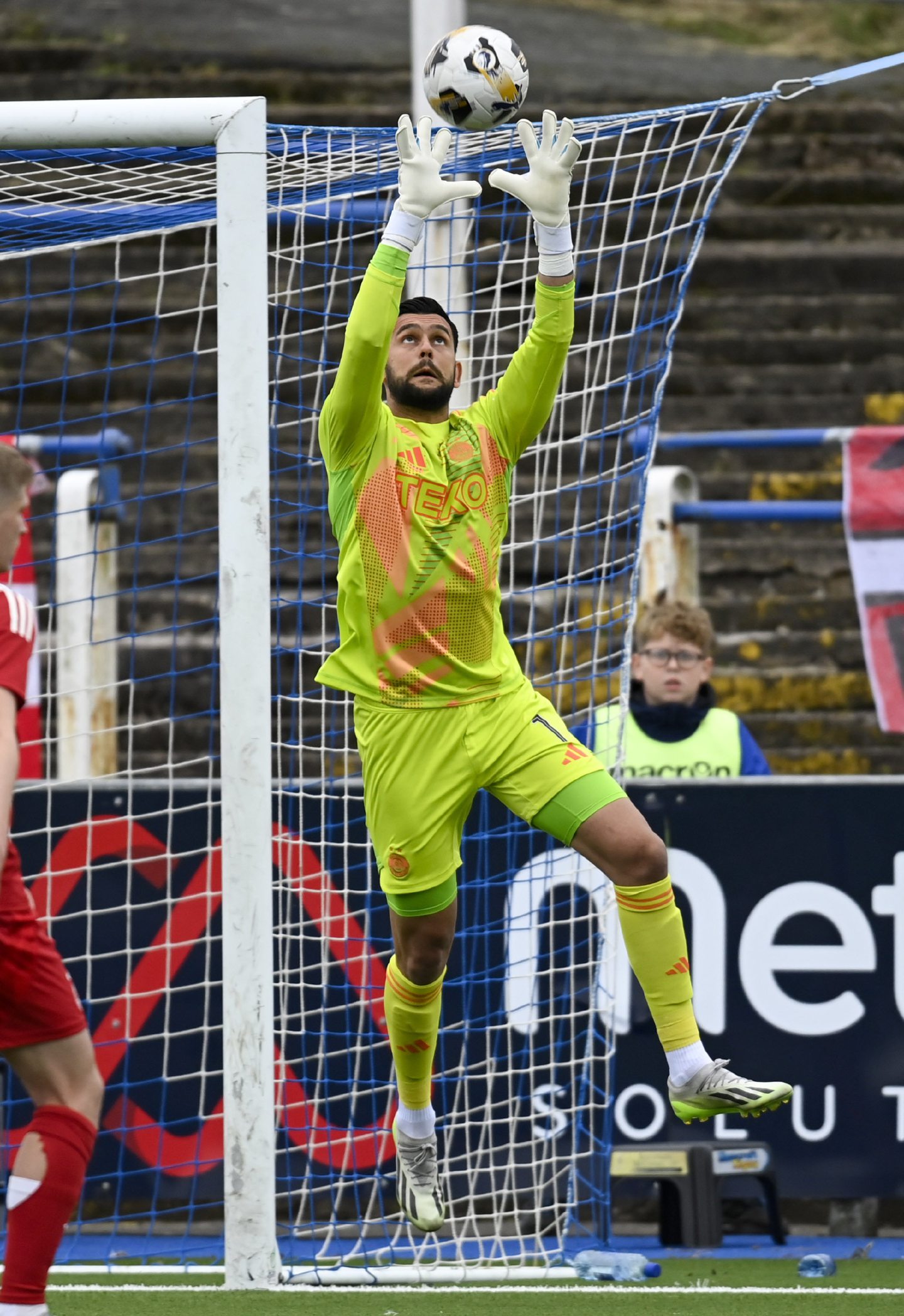 Aberdeen's Dimitar Mitov in action during a Premier Sports Cup group stage match against Queen of the South. Image: SNS