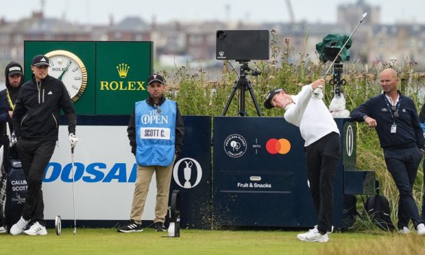 Calum Scott of Scotland during a practice round ahead of the 152nd Open Championship at Royal Troon, on July 16, 2024, in Troon, Scotland. Ludvig Aberg, his former Texax Tech team-mate, watches on, left. Image: SNS.