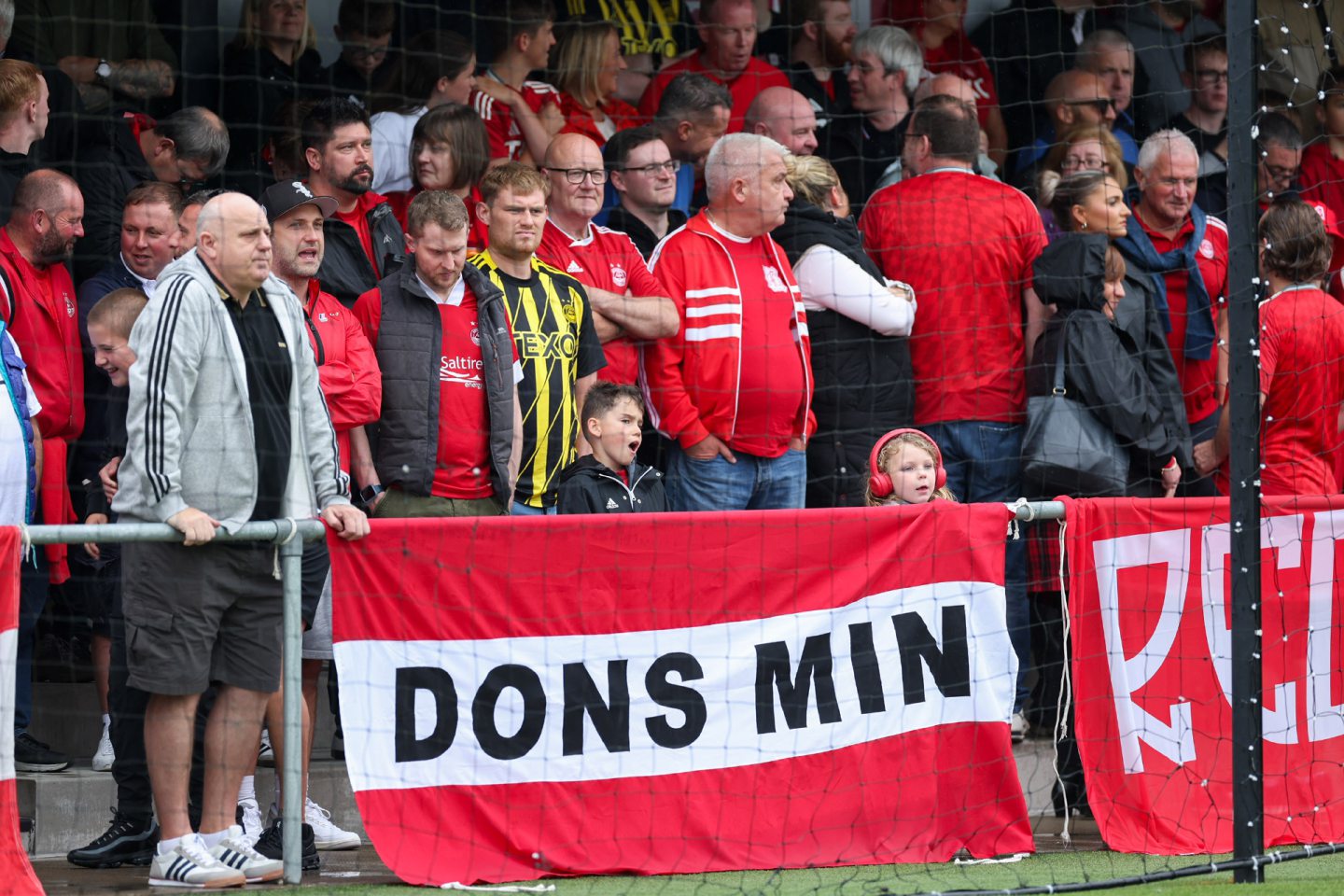 Aberdeen fans in the stand during a Premier Sports Cup group stage match at East Kilbride. Image: SNS