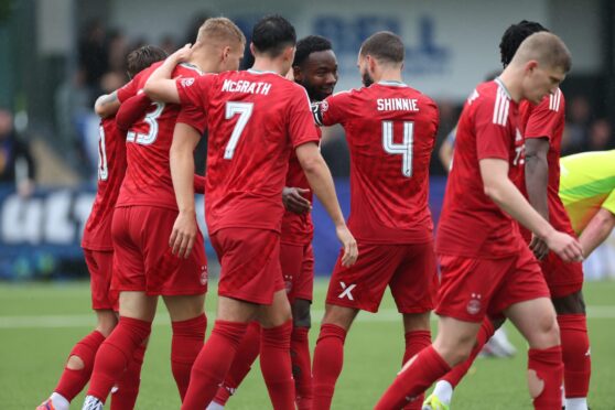 Aberdeen's Shayden Morris celebrates scoring to make it 4-0 with his teammates against East Kilbride. Image: SNS