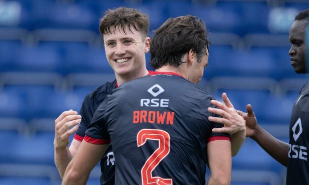George Harmon celebrates his winning goal against Raith Rovers with James Brown. Image: SNS