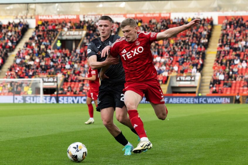 Aberdeen's Jack Mackenzie and Airdrie's Dylan MacDonald in action during a Premier Sports Cup group stage match. Image: SNS