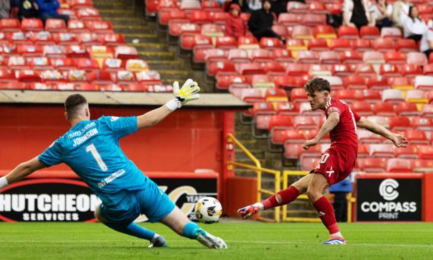 Leighton Clarkson scores to make it 2-1 Aberdeen during a Premier Sports Cup group stage match against Airdrieonians. Image: SNS.