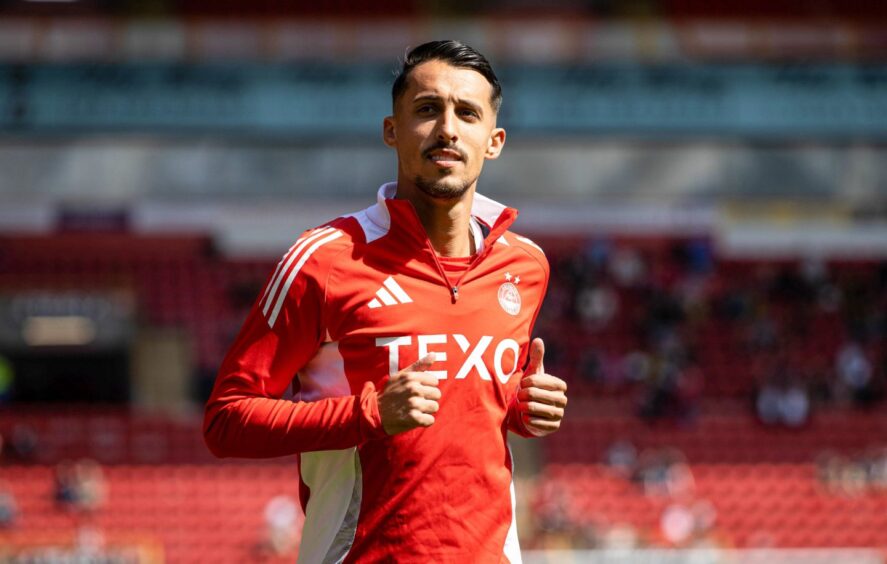 Aberdeen's Bojan Miovski during the warm-up ahead of the Premier Sports Cup group stage match against Dumbarton at Pittodrie. Image: SNS