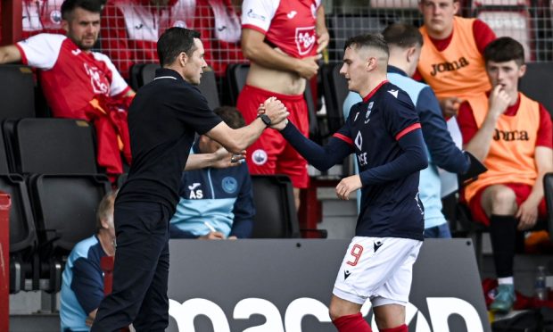 Ronan Hale is congratulated by Ross County boss Don Cowie. Image: SNS