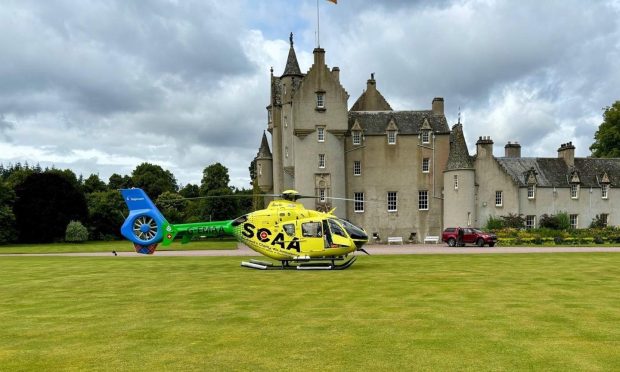 CSAA helicopter outside Ballindalloch Castle