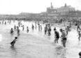 1970: Crowds enjoyed themselves on a sunny day at a packed Aberdeen Beach, in a photo from July 1970. Image: DC Thomson