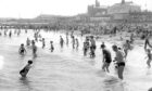 1970: Crowds enjoyed themselves on a sunny day at a packed Aberdeen Beach, in a photo from July 1970. Image: DC Thomson