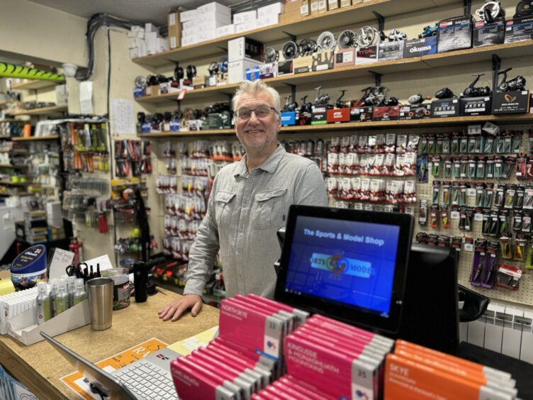 Andrew Downie pictured in Sport & Match shop dingwall high street