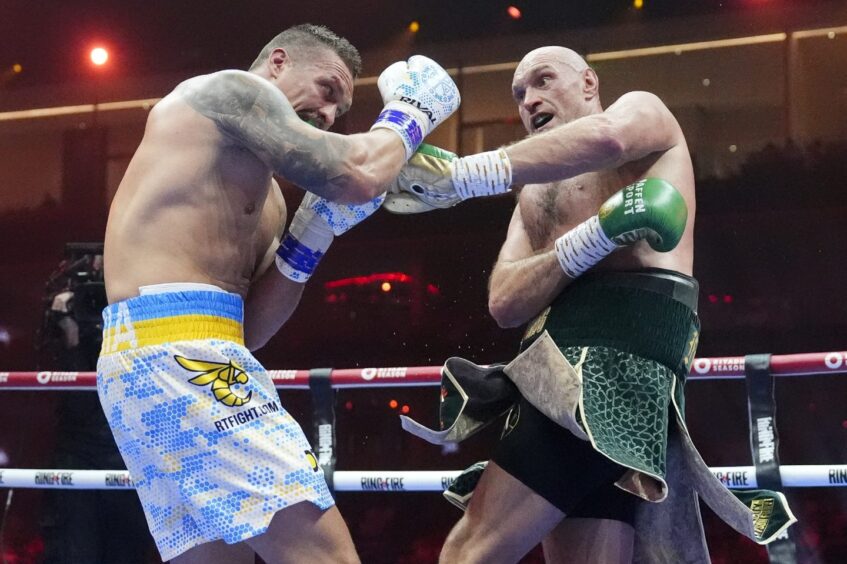 Tyson Fury in action against Oleksandr Usyk during the heavyweight fight at Kingdom Arena, Riyadh