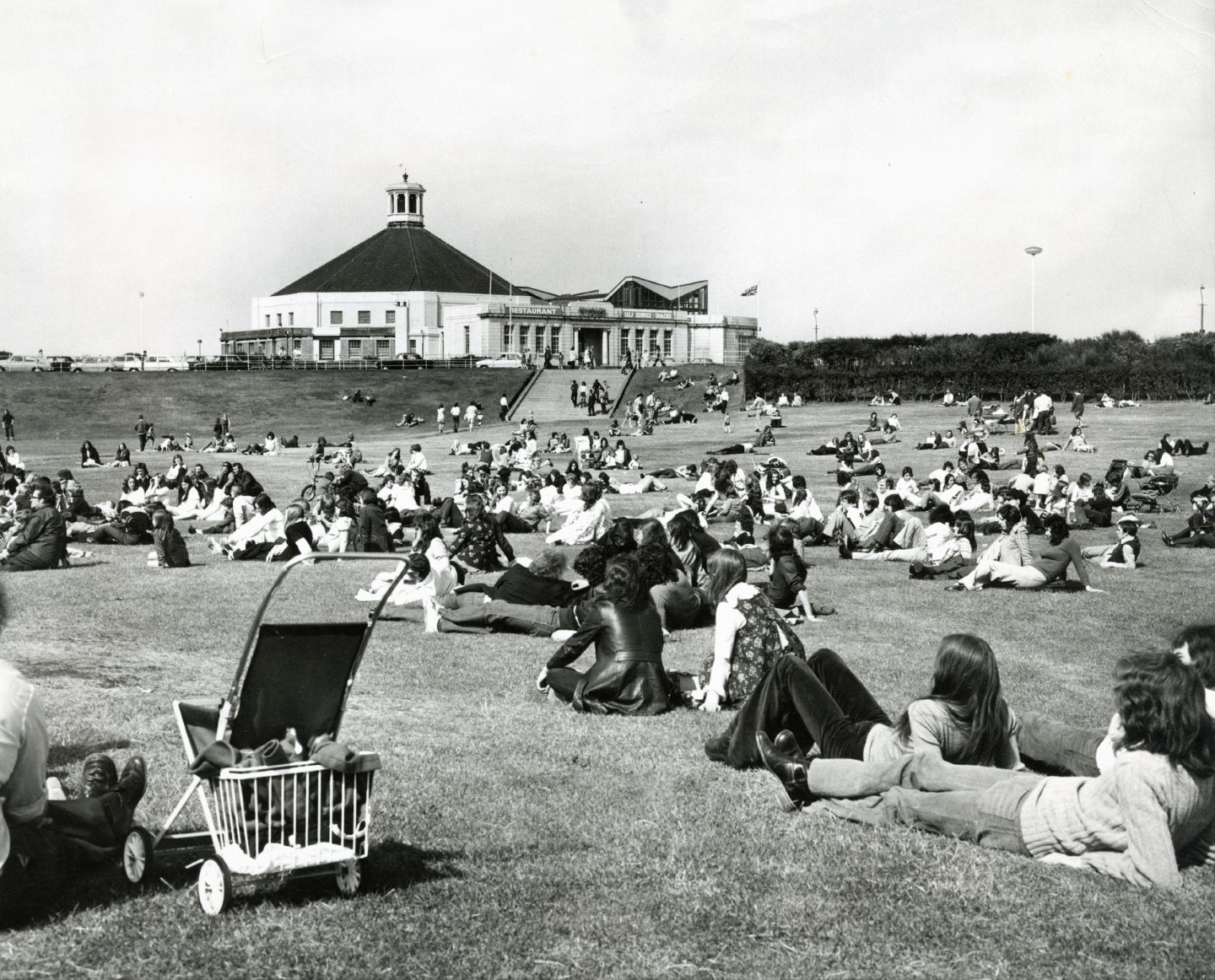 People relaxing outside the Beach Ballroom at Aberdeen Beach in 1973.