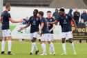 Ross County trialist Jordon Garrick celebrates netting against Brora Rangers. Image: Jasperimage.