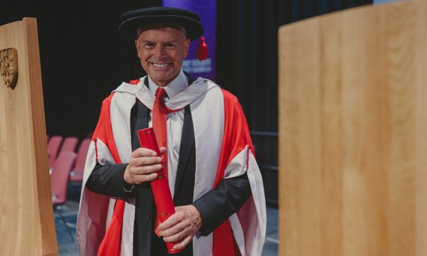 Aberdeen chairman Dave Cormack receives an honorary doctorate from Robert Gordon University. Image: RGU.