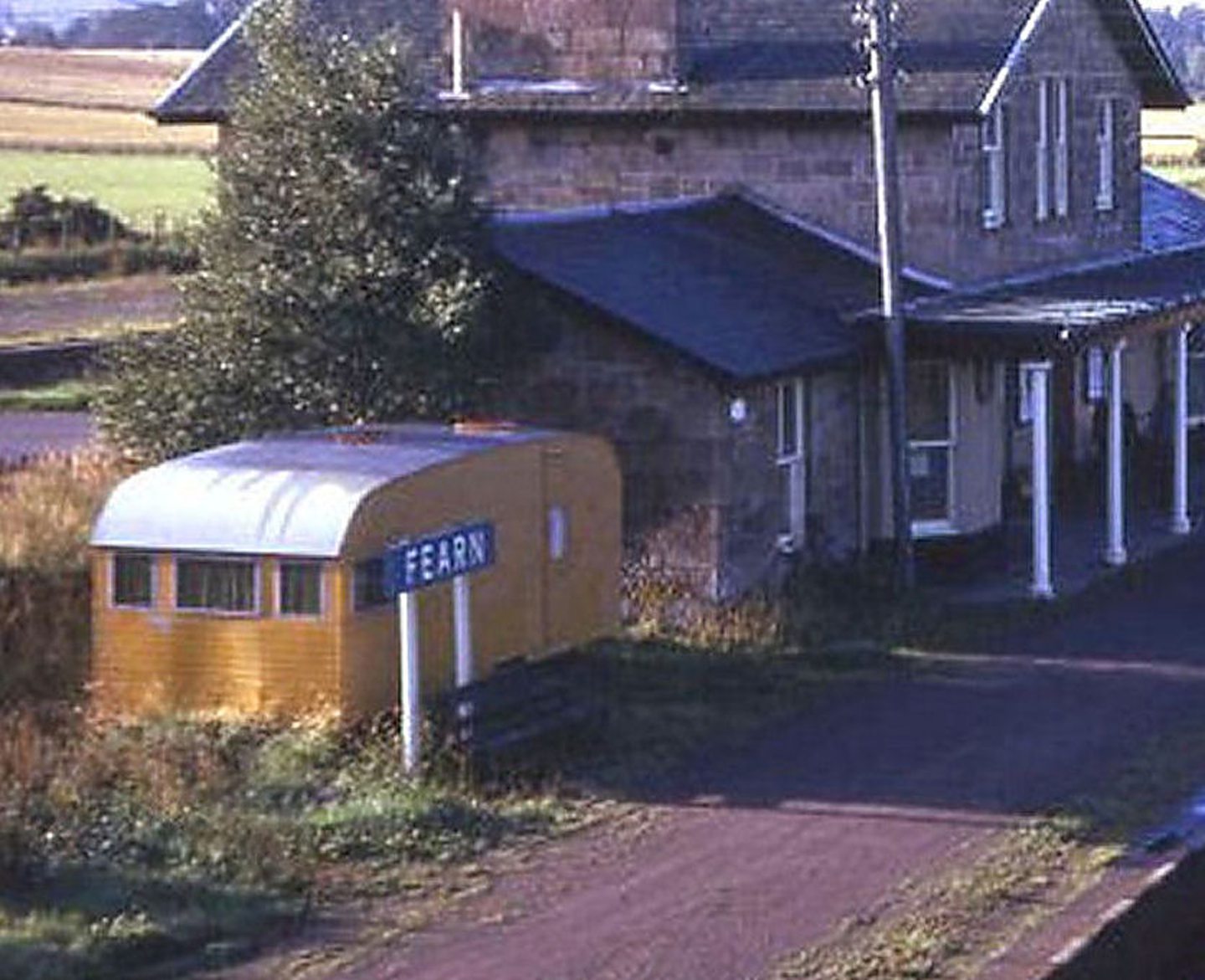 A yellow caravan installed adjacent to the platform and the ticket office at Fearn station for Mark's use when he found himself without accommodation. Image: David Spaven 1974.