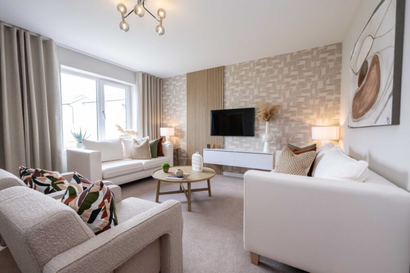 beautifully furnished living room in CHAP Homes' Crest of Lochter development