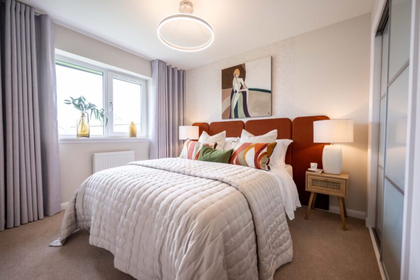 cosy bedroom with windows and beautiful furnishings