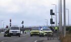 Police were pictured at the scene on the Charleston Flyover.
Image: Darrell Benns/DC Thomson