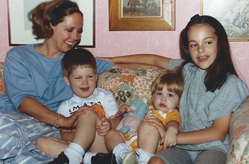 Liz Milne with her three children Jenny, Jonnie and Katie.