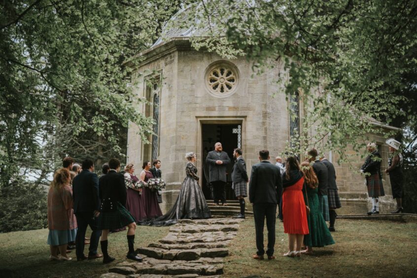 Wedding ceremony taking place. 