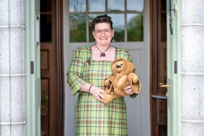 Isabel with Ben's teddy. 