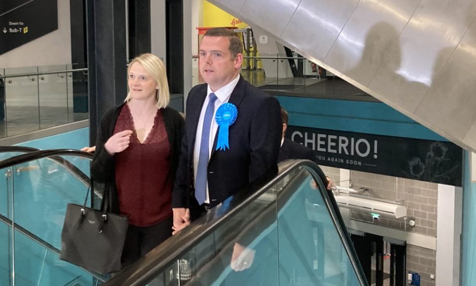 Douglas Ross and his wife Krystle arrive at the count