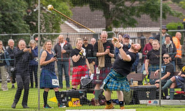 Throwing the hammer during the annual Highland Games held at Bught Park in Inverness. Image: Jasperimage