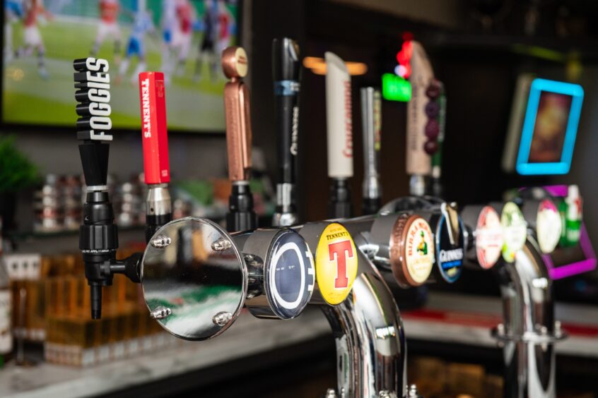 The beer taps on the bar show the range of drink on offer at Foggies in Elgin