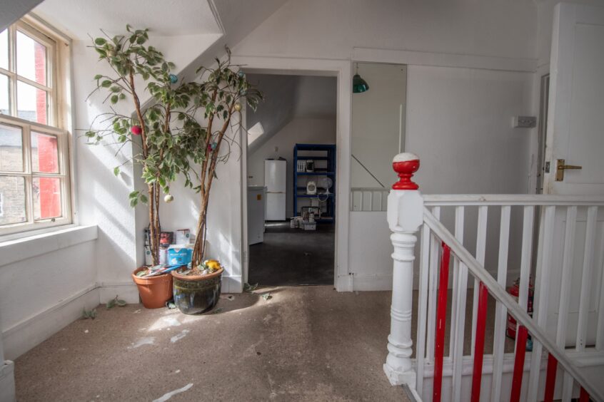 Upstairs, where there will be an office and the kitchen.