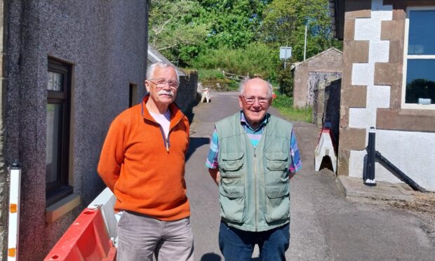 Johnshaven residents Michael Bennett and Don Marr at Seaview Terrace. Image: Kirstie Topp/DC Thomson