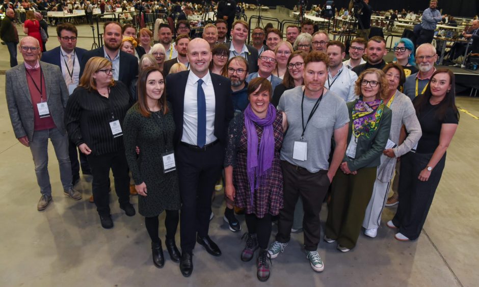 Stephen Flynn and Kirsty Blackman celebrate with SNP activists after holding onto their seats in Aberdeen.