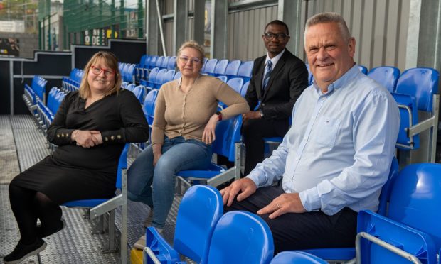 Banks o' Dee president Brian Winton, right, in the stand at Spain Park along with Gillian Forbes, left, (QDI - Quality Diversity and Inclusion Officer), Carmen de Andres, second from left, (club doctor) and Charles Igbelokotor (chaplain and wellbeing officer). Pictures by Kenny Elrick/DC Thomson