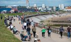 Families enjoying the sun at Aberdeen beach on Sunday. Image: Kenny Elrick/DC Thomson