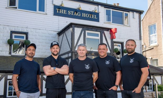 Big Manny's Pizza is set to come to Banchory. Pictured from from left to right is franchisee Karan Batra, Calum Wright, Bruce McCombie, Mark Anderson and Scott McCombie. Image: Kenny Elrick/DC Thomson