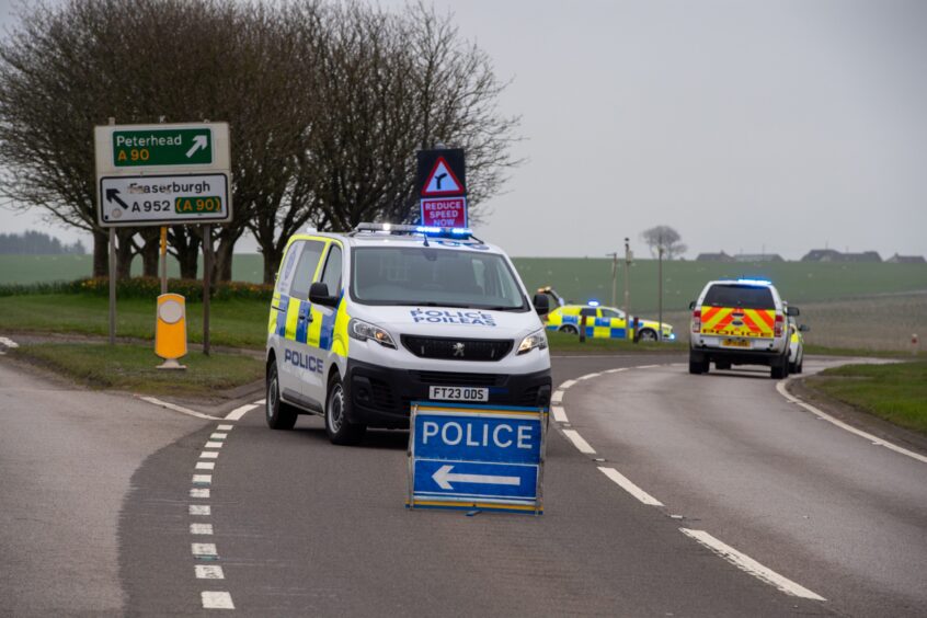Police at site of crash on A90 Toll of Birness in May.